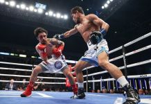 Murodjon Akhmadaliev mantuvo sus coronas ante un correoso José Velásquez